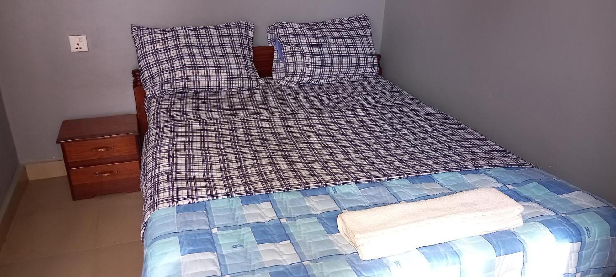 קיגאלי G Masters Homes חדר תמונה